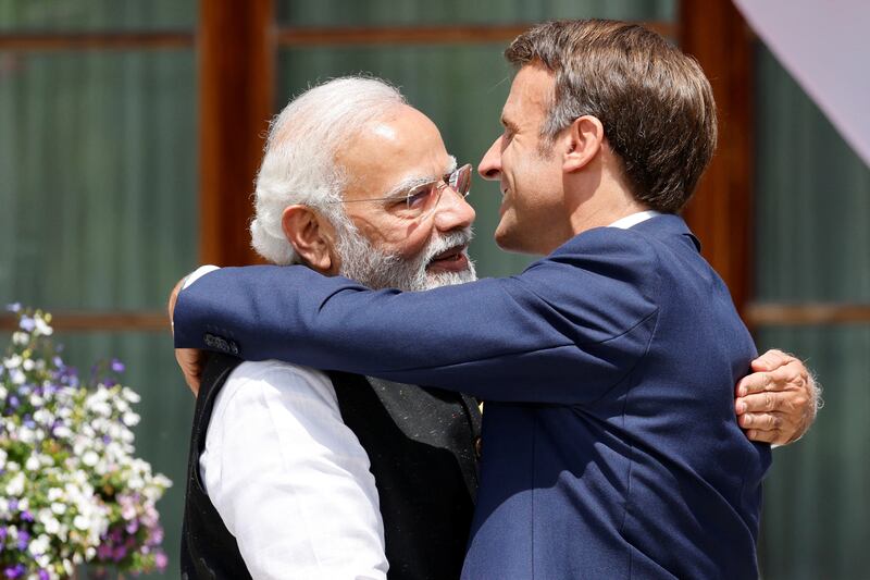 India's Prime Minister Narendra Modi and France's President Emmanuel Macron during the G7 leaders' summit in June. Reuters