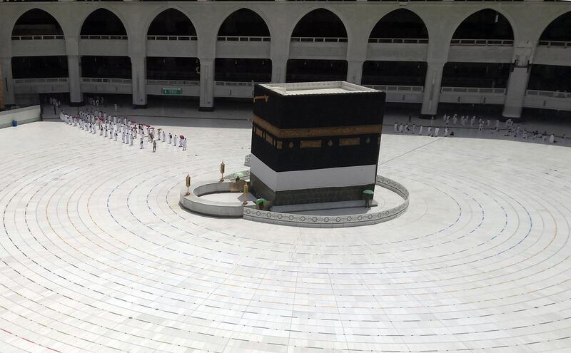 Muslim pilgrims line up after they circumambulate around the Kaaba. AP Photo