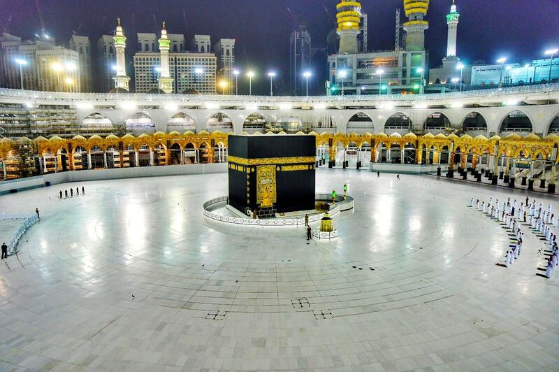 Muslims pray during the Laylat al-Qadr, or Night of Power, the holiest night for Muslims, while practicing social distancing, following the outbreak of the coronavirus disease (COVID-19), during the fasting month of Ramadan, at the Grand Mosque in Mecca, Saudi Arabia May 19, 2020. Saudi Press Agency/Handout via REUTERS ATTENTION EDITORS - THIS PICTURE WAS PROVIDED BY A THIRD PARTY.     TPX IMAGES OF THE DAY