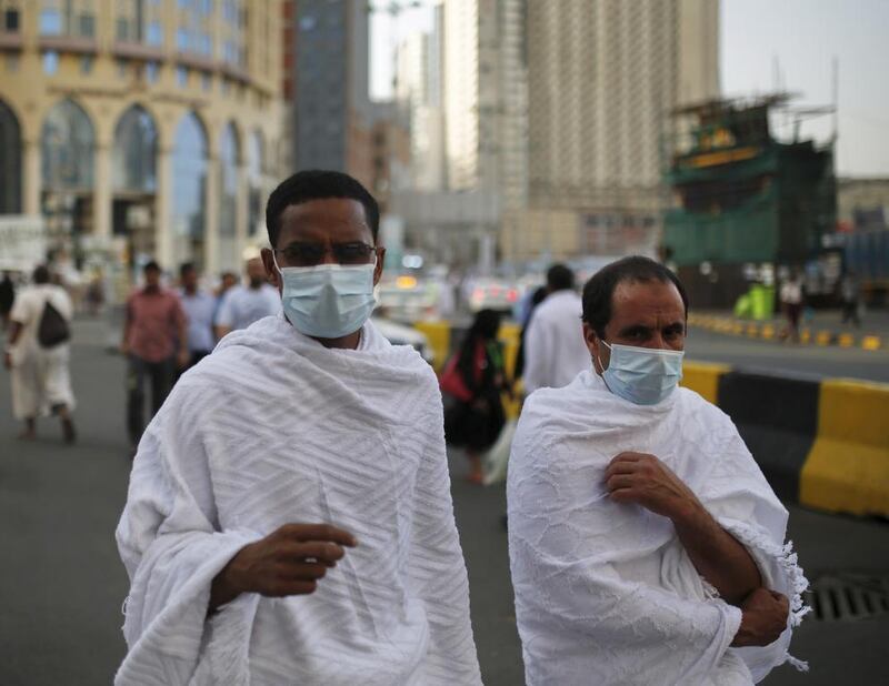 Face masks protect the wearers from dust and germs. Ahmad Masood / Reuters