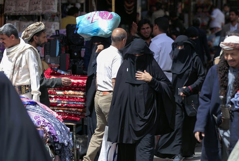 Yemeni women shop in the old city market of the capital Sanaa. In recent months, a series of incidents in the rebel-held north illustrates the Houthis' determination to impose their own moral order on Yemenis who have already endured five years of grinding conflict. AFP