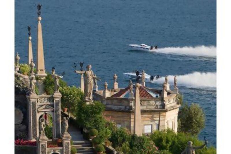 The Skydive Dubai tam boats cut through the water on Lake Maggiore in Italy on Saturday. Simon Palfrader