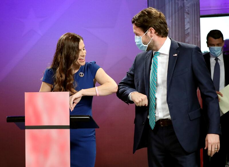 Republican challenger and state Rep. Nancy Mace and Democratic US Rep. Joe Cunningham greet each other prior to their debate at the SCETV studios in Beaufort, SC, in South Carolina's 1st Congressional District seat race. The Post And Courier via AP