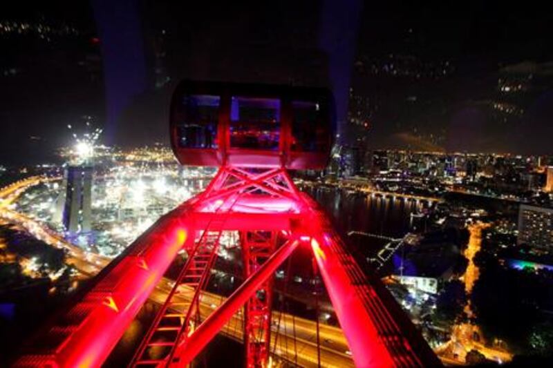 A view of Singapore sparkling by night from the giant Singapore Flyer at Marina Bay. At 165 metres high, it is the world’s tallest observation wheel.