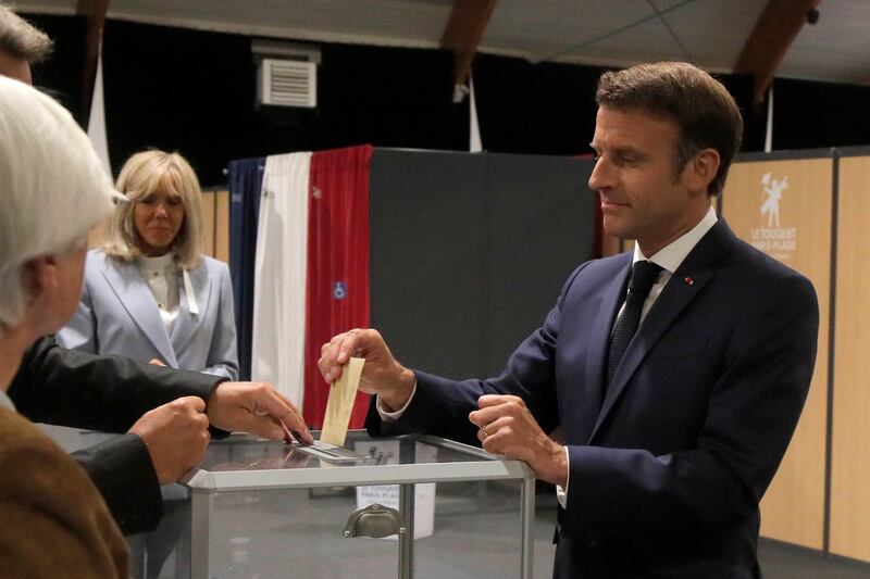 Mr Macron casts his ballot. The outcome will determine how much leeway his party will have to implement an ambitious domestic agenda. EPA