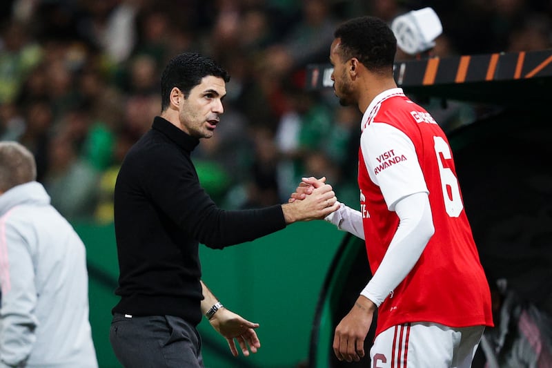 Arsenal manager Mikel Arteta and Gabriel Magalhaes after their Europa League last 16 first leg against Sporting CP. AFP