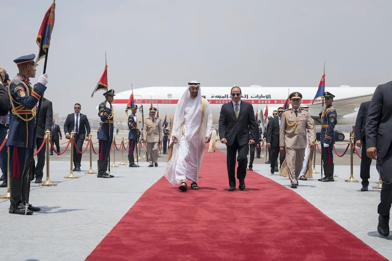 CAIRO, EGYPT - August 07, 2018: HH Sheikh Mohamed bin Zayed Al Nahyan Crown Prince of Abu Dhabi and Deputy Supreme Commander of the UAE Armed Forces (centre L), is received by HE Abdel Fattah El Sisi, President of Egypt (centre R), upon arrival at Cairo international Airport, commencing an official visit.

( Mohamed Al Hammadi / Crown Prince Court - Abu Dhabi )
---