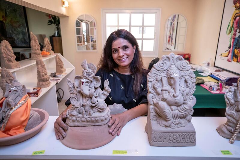 DUBAI, UNITED ARAB EMIRATES. 18 AUGUST 2020.  Savvy Kisani,  a Dubai resident who hand sculpts clay Ganesh idols at home. This is being advised for use during the current COVID-19 pandemic since the statues can be immersed in water at home and the clay can be used in gardens and in potted plants. Authorities have urged the Hindu community not to congregate in homes and against hiring boats and abras to immerse the Ganesh idol in the sea. (Photo: Antonie Robertson/The National) Journalist: Ramola Talwar. Section: National.