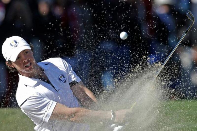 Europe's Rory McIlroy hits out of a bunker on the 14th hole during a singles match at the Ryder Cup PGA golf tournament Sunday, Sept. 30, 2012, at the Medinah Country Club in Medinah, Ill. (AP Photo/Chris Carlson) 