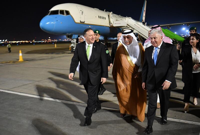 Mike Pompeo walks after stepping off his plane upon arrival at King Abdulaziz International Airport in Jeddah, Saudi Arabia.  AFP