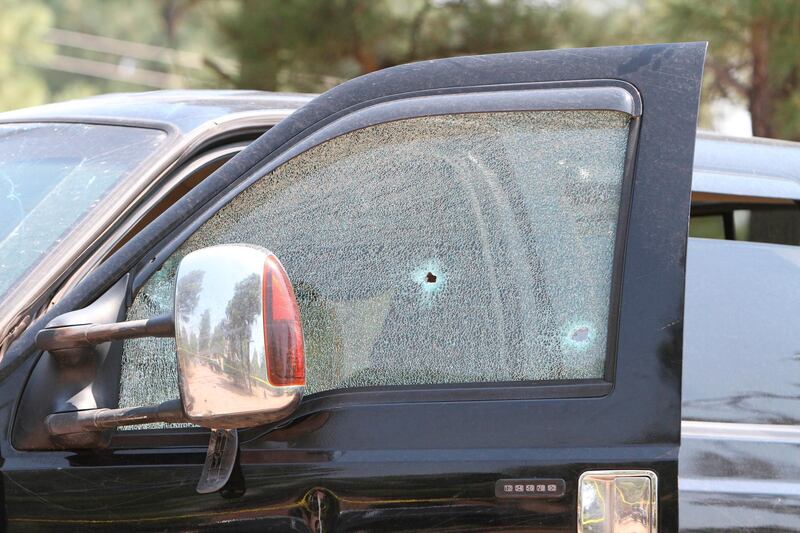 The driver abandoned the vehicle, which was shot at during the incident. AP