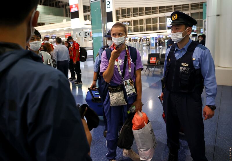 A Reuters photographer saw the athlete standing next to police at the airport. "I think I am safe," Tsimanouskaya said. "I am with the police."