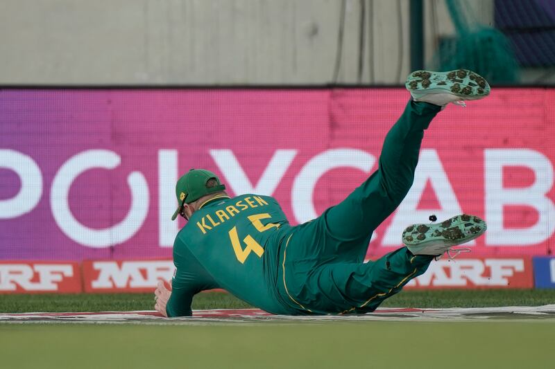 South Africa's Heinrich Klaasen dives to take the catch to dismiss the Netherlands' Vikram Singh. AP 
