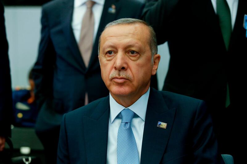 Turkey's President Recep Tayyip Erdogan attends the second day of the NATO (North Atlantic Treaty Organization) summit, in Brussels, on July 12, 2018.  / AFP / GEOFFROY VAN DER HASSELT
