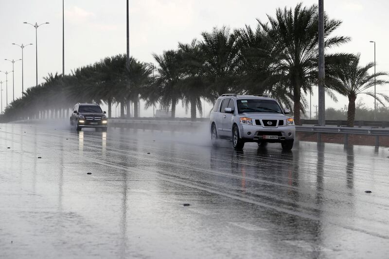 AL AIN , UNITED ARAB EMIRATES , DEC 18  – 2017 :- Traffic during the rain on Dubai – Al Ain road in Al Ain.  (Pawan Singh / The National) 