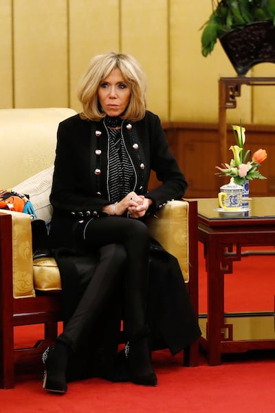 Brigitte wears a Louis Vuitton military-style jacket to a meeting in Beijing in January 2018. AFP