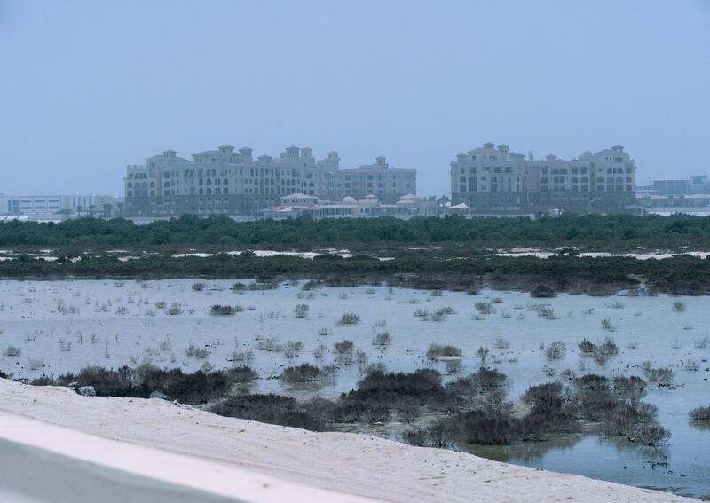 Hazy weather along the E12 Highway, Al Jubail, Abu Dhabi on June 15, 2021. Victor Besa / The National.