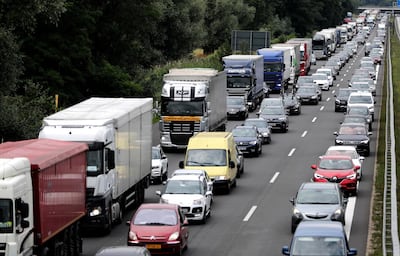 epa08565399 Cars in a traffic on the German highway A10, a.k.a. Berliner Ring, near Berlin, Germany, 25 July 2020.  EPA/HAYOUNG JEON