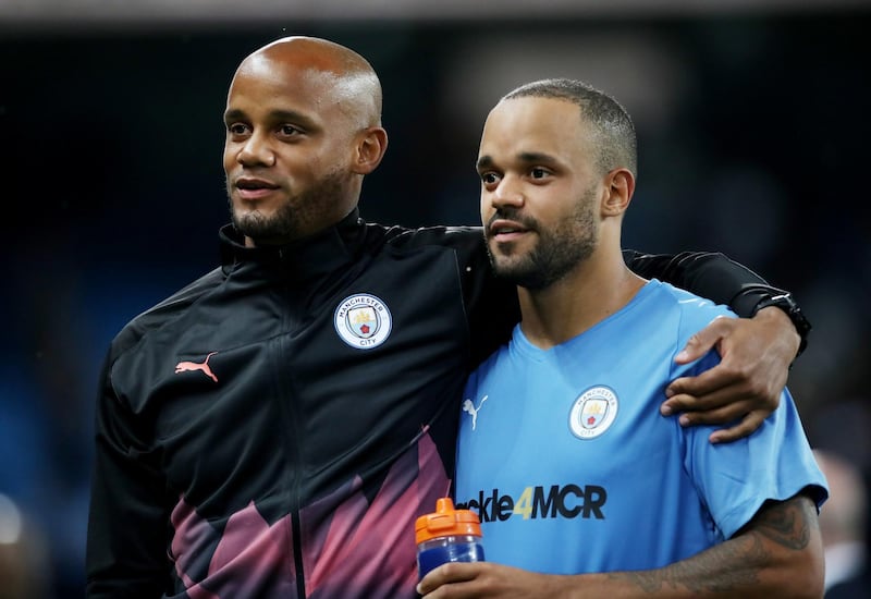 Vincent Kompany, left, with brother Francois, following the Cincent Kompany Testimonial match at Etihad Stadium between Manchester City Legends v Premier League All-Stars. The match ended 2-2. Reuters
