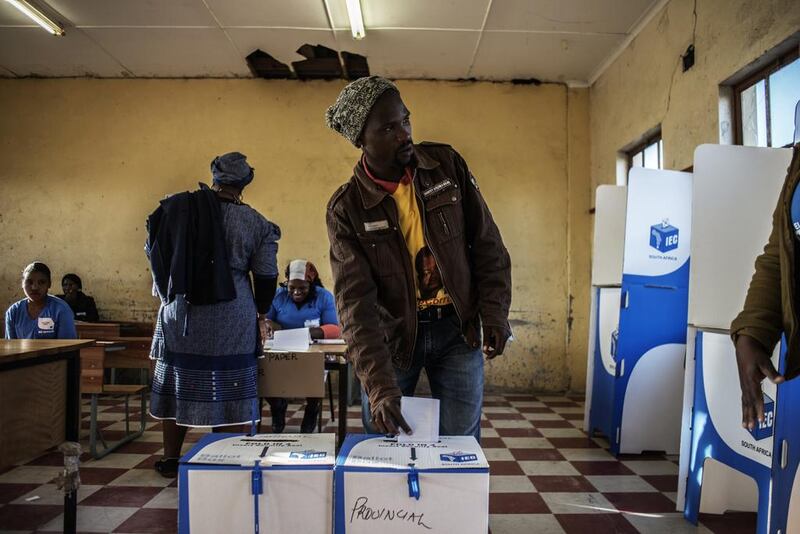 A resident of Qunu village in the Eastern Cape casts his ballot. Nearly 2,000 military personnel are assisting police in keeping order around the country. Gianluigi Guercia / AFP