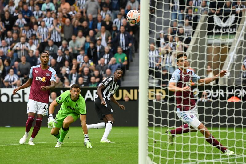 Alexander Isak of Newcastle United scores the team's third goal against Villa. Getty
