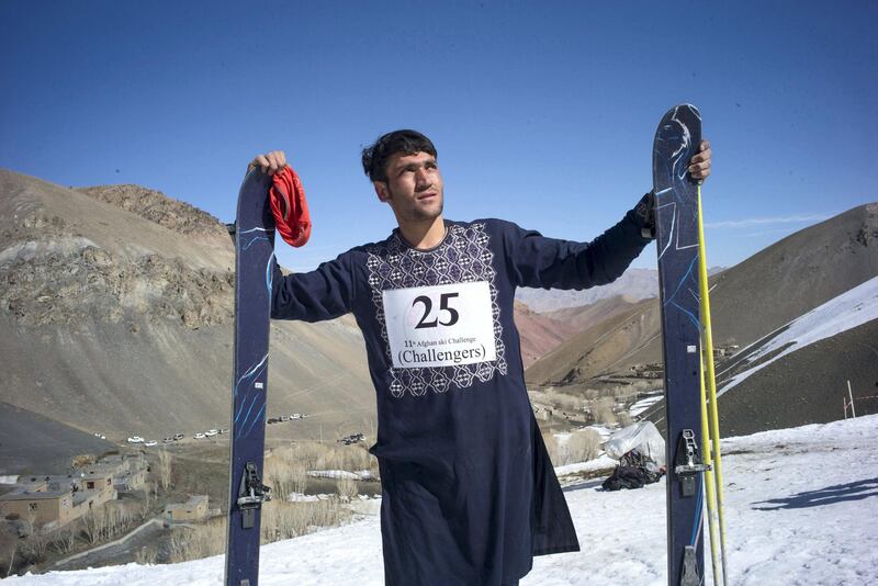 AFGHANISTAN, Bamiyan: 05 March 2021
Pictures from the annual Afghan Mountain Challenge - a ski event held in Bamiyan Province, 80 miles west of Kabul. Participants have to run up the mountain via specific checkpoints and then proceed to ski down. 
Pictured - Four time champion Mushtaba Husaini, 20, poses for a picture - he came third this year. Rick Findler for The National