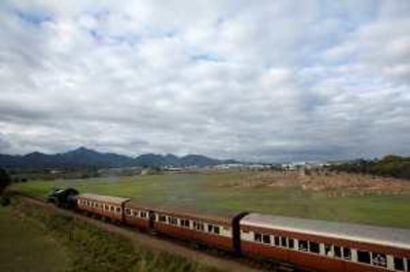 The Outeniqua Choo Tjoe, seen here steaming into George on its last journey on that line, is South Africa's only remaining scheduled steam train. The Choo Tjoe offers its passengers a unique, picturesque and scenic 52-kilometre journey experiencing the Garden Route with spectacular views of the Indian Ocean. The George / Mossel Bay line was officially opened by Sir Pieter Fraure on 25 September 1907. *** Local Caption ***  _MG_3194.jpg