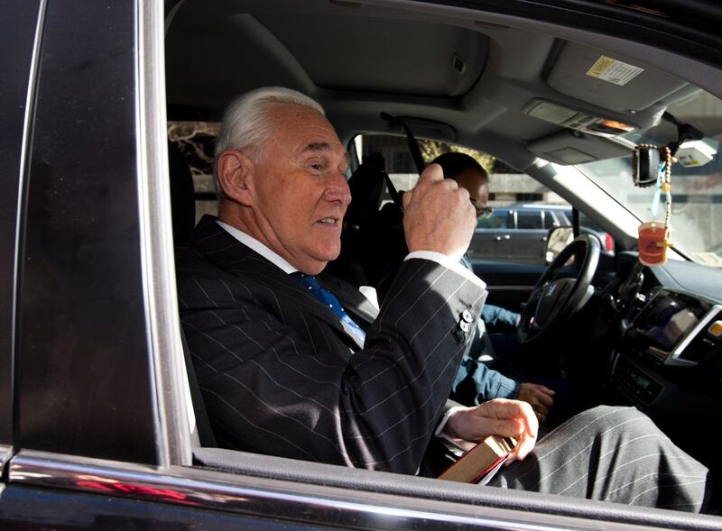 FILE - In this Nov. 15, 2019, file photo, Roger Stone leaves federal court in Washington. The Justice Department has sued former President Donald Trump's ally Stone, accusing him and his wife of failing to pay nearly $2 million in income tax.  (AP Photo/Jose Luis Magana, File)