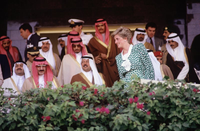 Diana, Princess of Wales, watches camel racing in Dubai in March 1989, during a tour of the Gulf states with her husband, the heir to the British throne Prince Charles. Getty