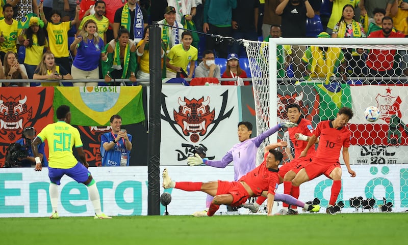 Vinicius Junior scores Brazil's opening goal. Reuters