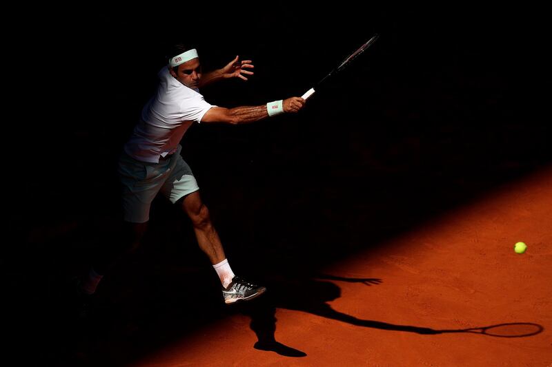 Federer in action from the back of the court. Getty