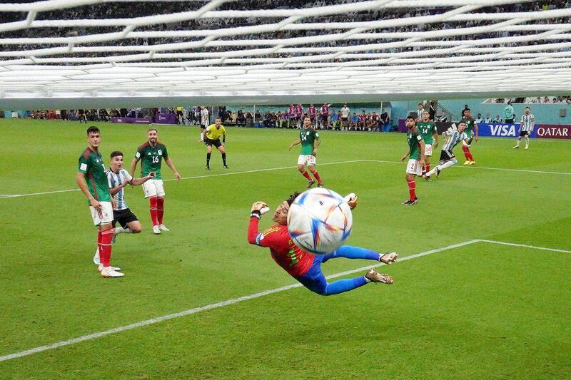 Enzo Fernandez scores Argentina's second goal past Guillermo Ochoa. Getty