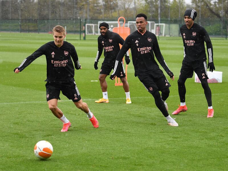 ST ALBANS, ENGLAND - MAY 05: (L-R) Martin Odegaard, Alexandre Lacazette, Gabriel Magalhaes and Pierre-Emerick Aubameyang of Arsenal during the Arsenal 1st team training session at London Colney on May 05, 2021 in St Albans, England. (Photo by David Price/Arsenal FC via Getty Images)
