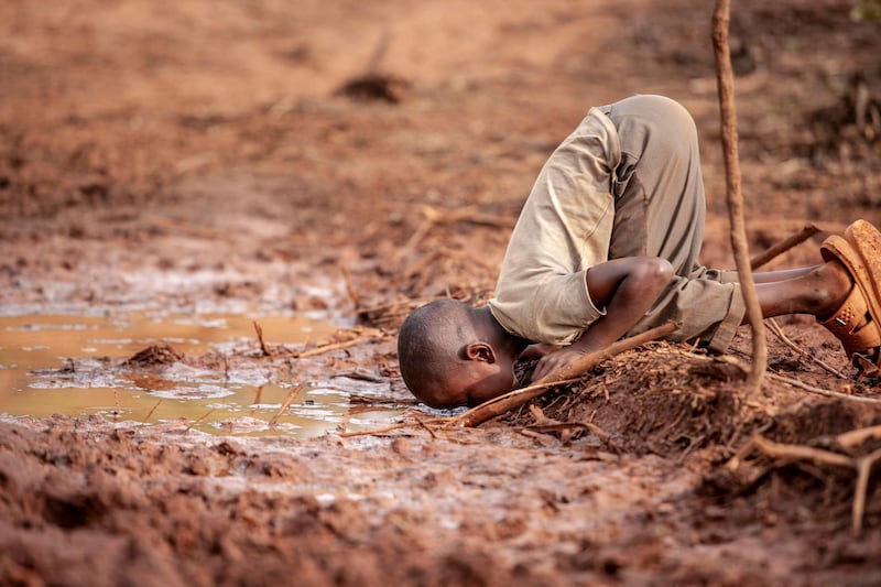 Frederick Dharshie Wissah - Water Scarcity (Kakamega, Kenya)
A young boy drinking dirty water due to lack of water points in the area due to deforestation thus this leading to health risks to the boy