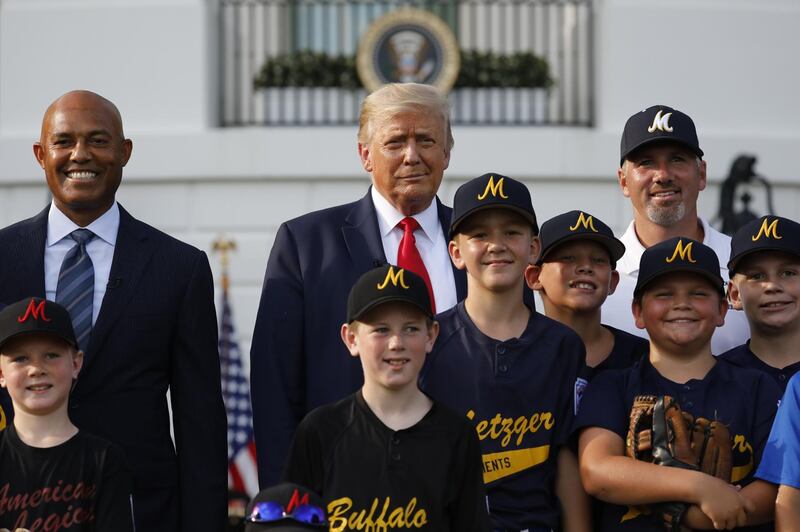 US President Donald Trump, centre, and Mariano Rivera, former pitcher for the New York Yankees, left, at the White House with Little League baseball players. Bloomberg