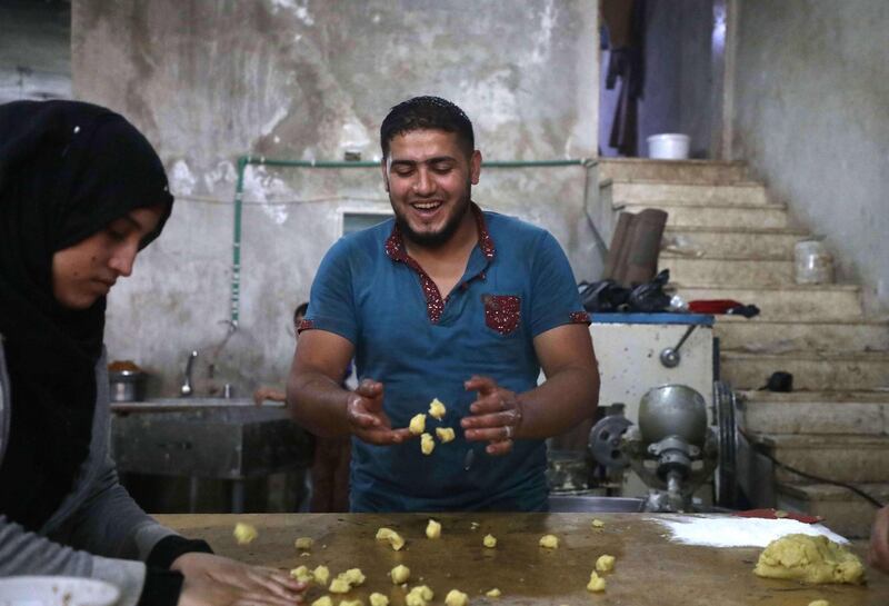 At a bakery run by displaced Syrians in the town of Dana, east of the Turkish-Syrian border in the northwestern Idlib province. Aaref Watad / AFP