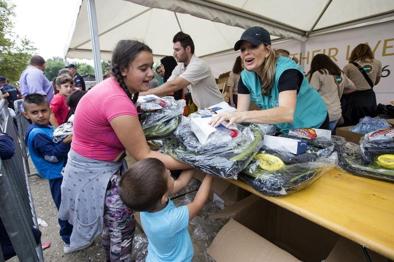 Etihad Airways volunteers on Wednesday delivered care packages to refugees in Krjna, near the Serbian capital of Belgrade. Their work was part of the carrier’s Colour Their Lives initiative, in coordination with partner airline Air Serbia. Christopher Pike / The National