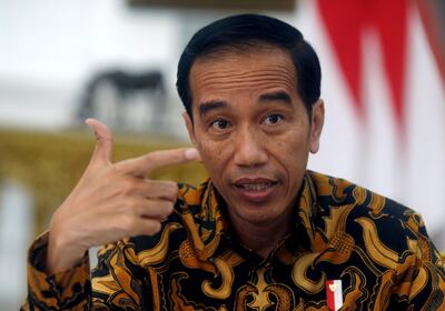 FILE PHOTO: Indonesia's President Joko Widodo gestures during an interview with Reuters in Jakarta, Indonesia, July 3, 2017. REUTERS/Beawiharta/File photo