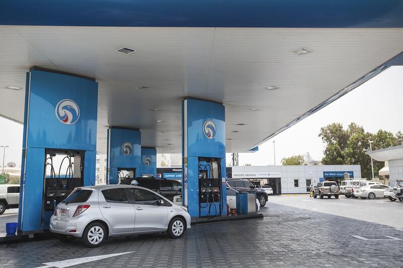 Consumers will pay Dh1.86 a litre for Super 98, compared to last month’s figure of Dh1.96.  Mona Al Marzooqi / The National 