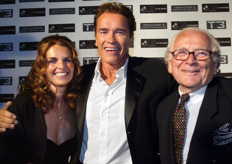 Arnold Schwarzenegger and Maria Shriver with Pierre Cardin during a' Terminator 3' party at the 56th Cannes Film Festival in 2003. AFP