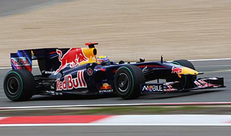 Mark Webber in action in his Red Bull-Renault as he drove to the first pole position of his career.