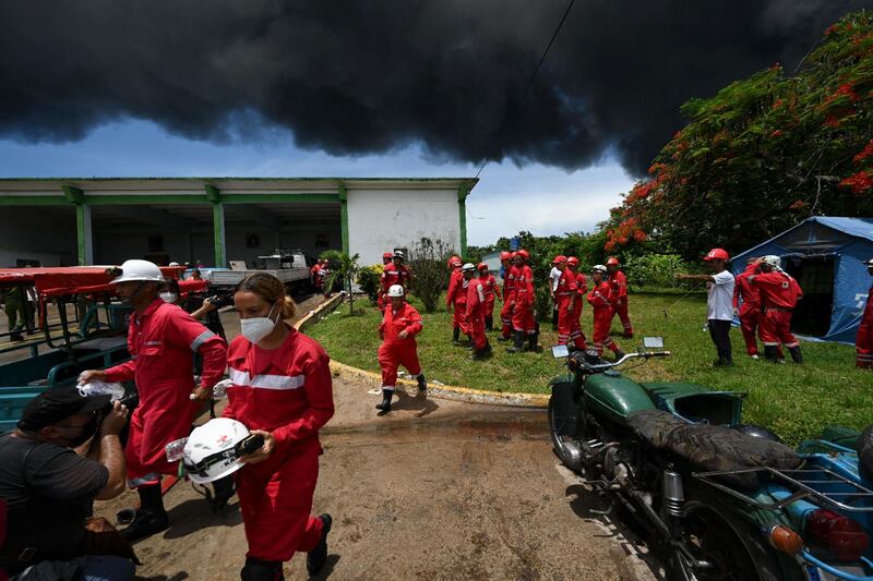 Firefighters in action in Matanzas, western Cuba. AFP