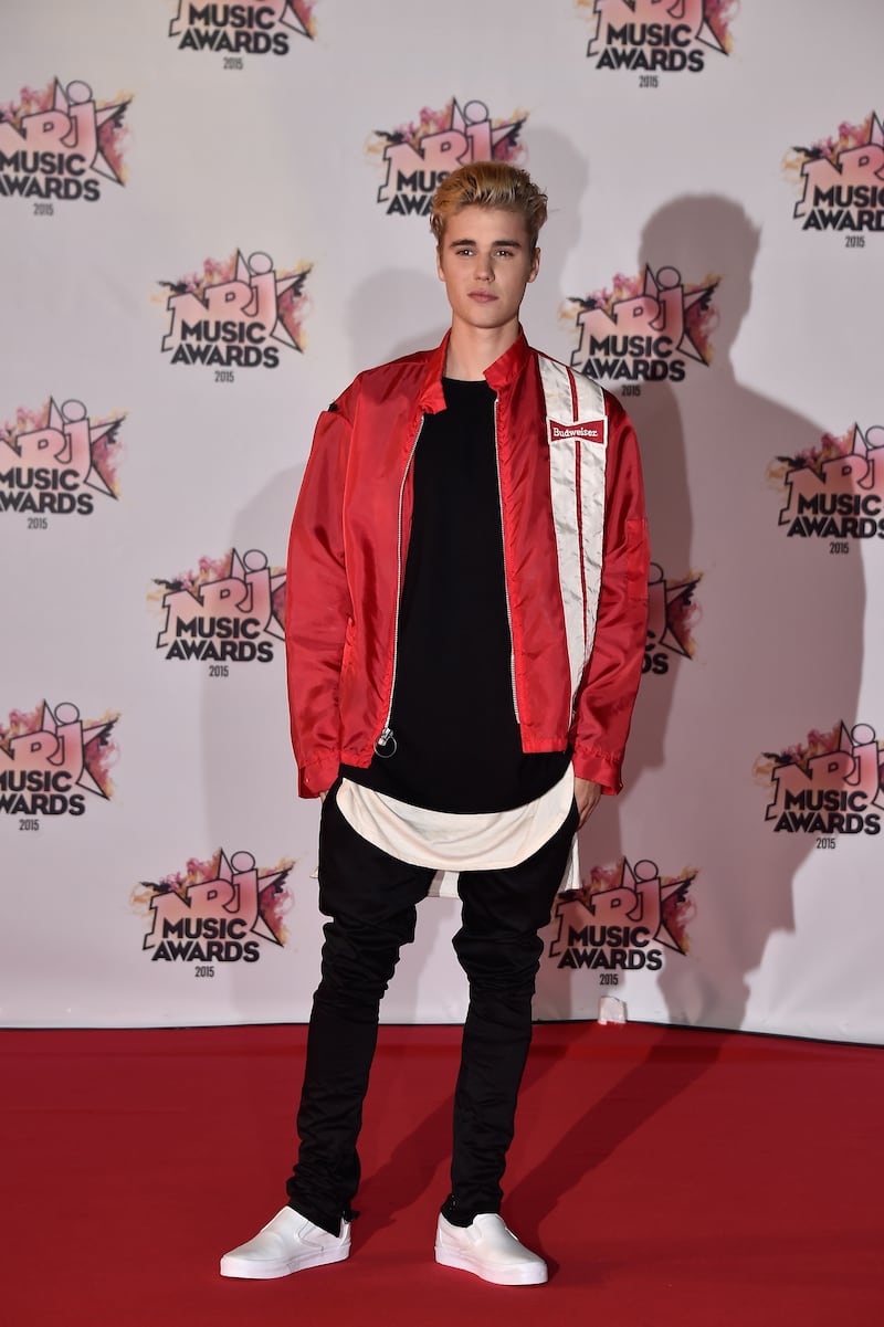 Justin Bieber, in a vintage Budweiser Racing Jacket, attends the 17th NRJ Music Awards at Palais des Festivals on November 7, 2015, in Cannes, France. Getty Images