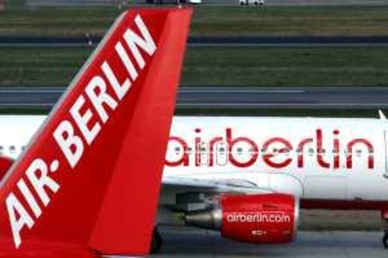 Air Berlin Plc airplanes are seen at Tegel airport in Berlin, Germany, on Wednesday, Oct. 14, 2009. Air Berlin Plc's September passenger numbers fell 5.1 percent to 2.71 million as capacity declined 4.8 percent. Photographer: Michele Tantussi/Bloomberg