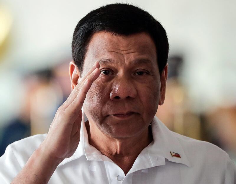 epa06991736 Philippines President Rodrigo Duterte salutes at the Manila International Airport in Pasay City, south of Manila, Philippines 02 September 2018. Duterte will be on an official visit to Israel from 02 to 05 September.  EPA/MARK R. CRISTINO