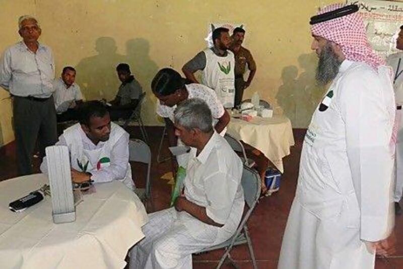 Omar Abdullah Al Marzouqi, right, on a field trip in Sri Lanka.