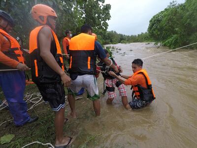 A rescue operation at a flooded village near the town of Gonzaga in the Philippines' Cagayan province. EPA