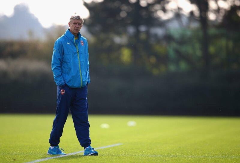 Manager Arsene Wenger of Arsenal conducts a team training session on Tuesday ahead of their Wednesday match against Galatasaray in the Champions League. Paul Gilham / Getty Images / September 30, 2014 