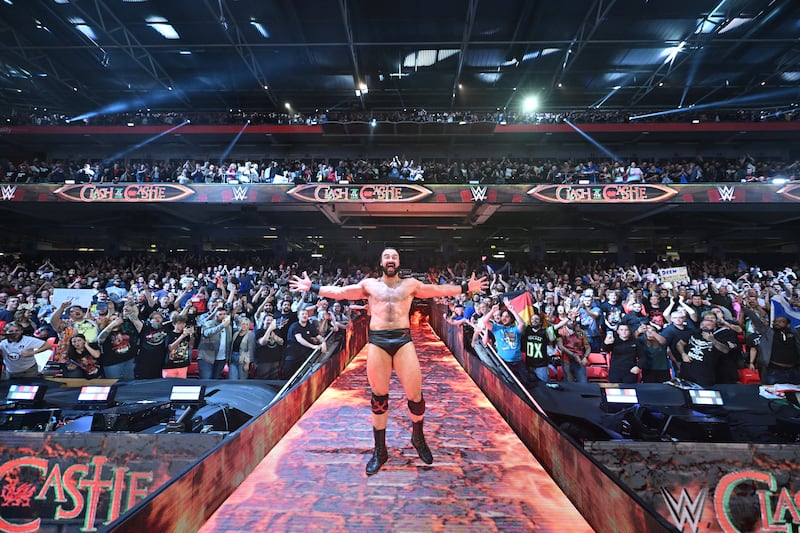 Drew McIntyre, the first ever UK WWE world champion, makes his way to the ring as the home town favourite. 