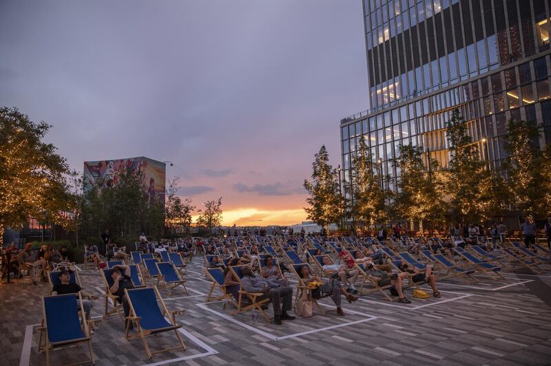 Moviegoers watch a screening of 'In the Heights' at the Tribeca Festival. Bloomberg